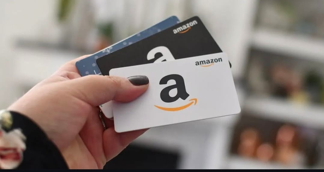 Person checking gift card balance online using GCVC manual verification service in the USA